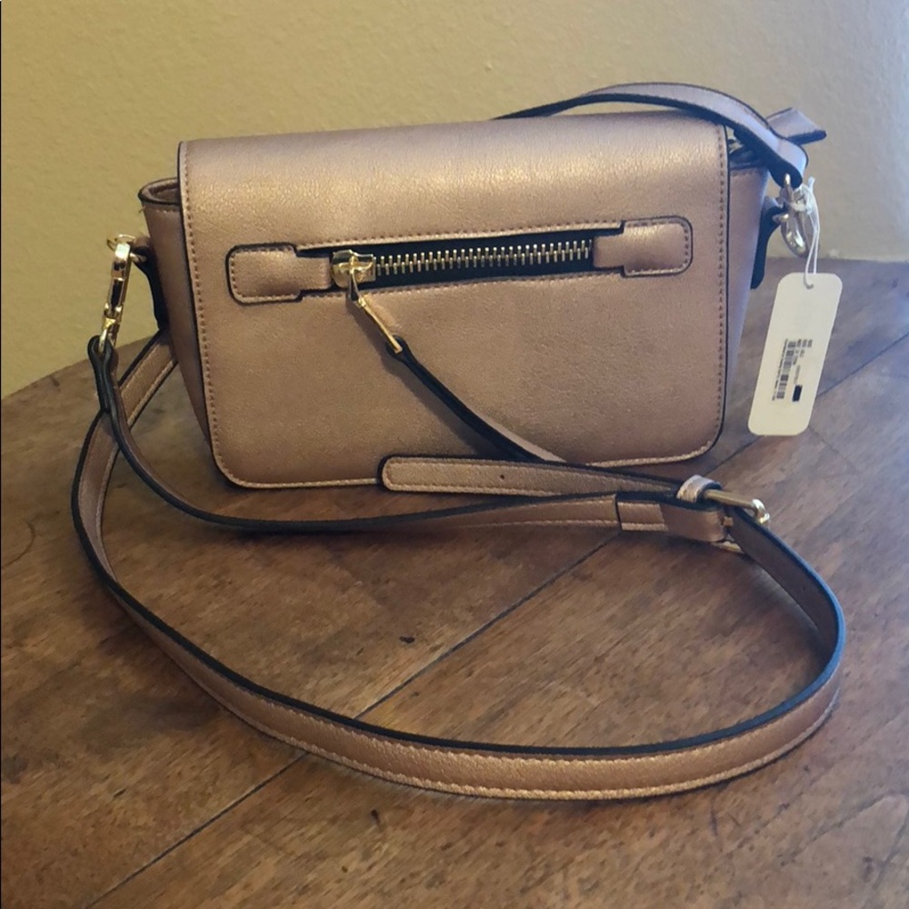 Blush crossbody bag with gold zipper